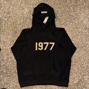 Black 1977 Essentials Hoodie